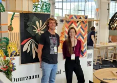 At the booth of Social Enterprise Binthout, Cor Wobma and Jouktje van Dijk can be found. A new table, lighting, and wall decoration were brought to attention.